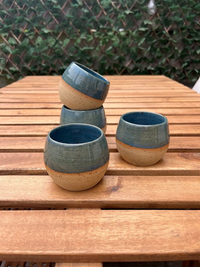 Material: 100% Durable Stoneware Clay
Dimensions: Approximately 6.5 cm x 7.0 cm (Ideal for single or double espresso shots)
Care Instructions: Fully dishwasher safe for effortless everyday cleaning
Unique Nature: Each piece is completely unique; expect minor, beautiful variations in size and finish from the items pictured.